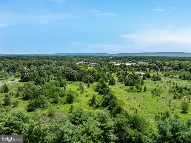 an aerial view of residential house with outdoor space