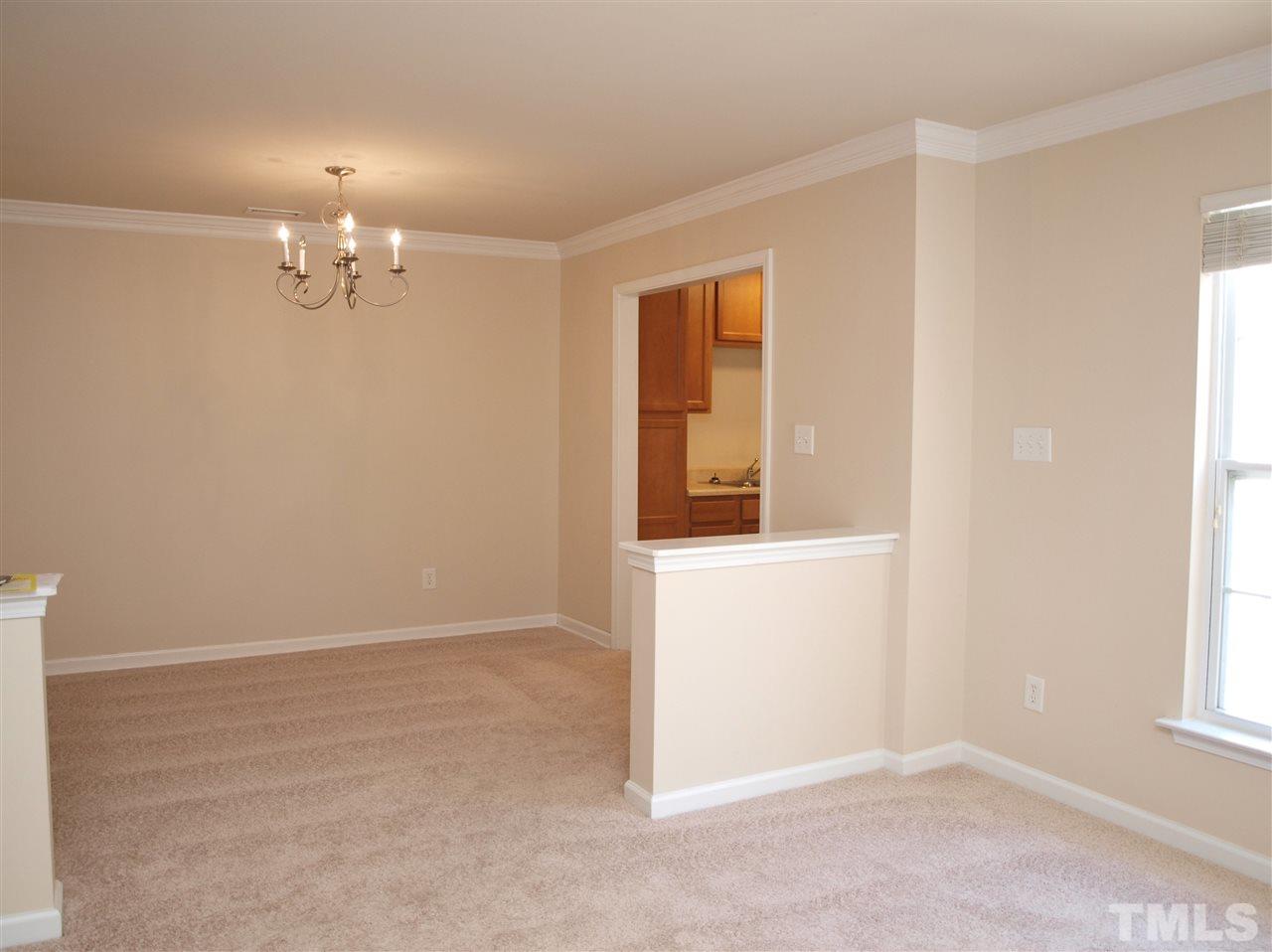 10126 Blackwell Drive Raleigh, NC 27617 - Photo 4 of 14 an empty room with windows