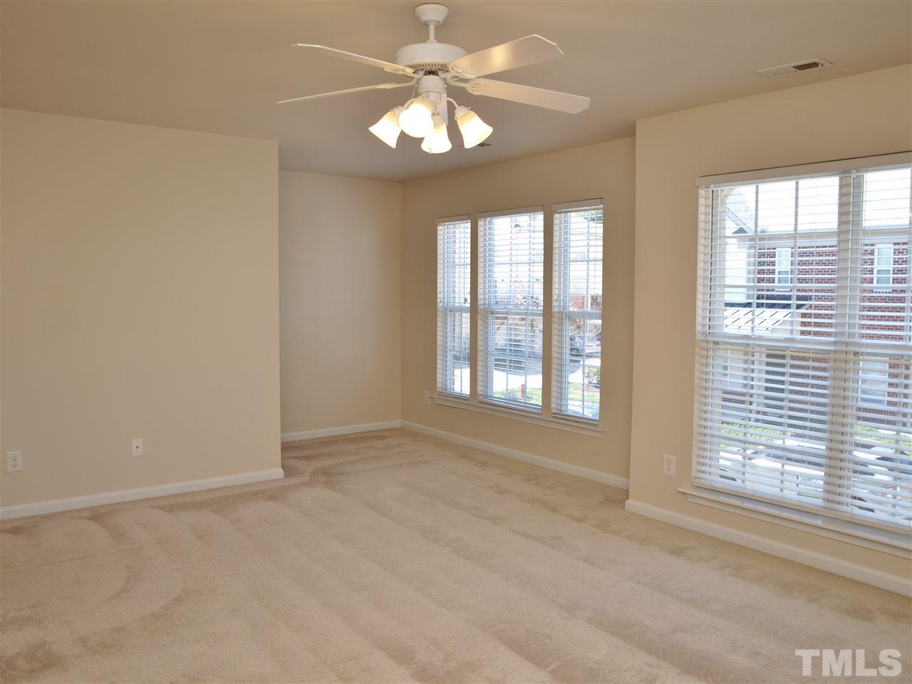10126 Blackwell Drive Raleigh, NC 27617 - Photo 6 of 14 a view of an empty room with a window