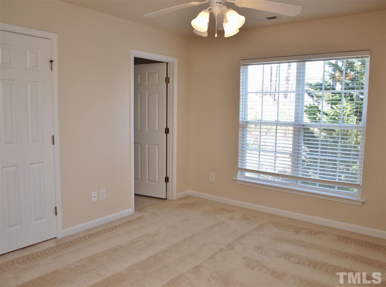 10126 Blackwell Drive Raleigh, NC 27617 - Photo 10 of 14 an empty room with window