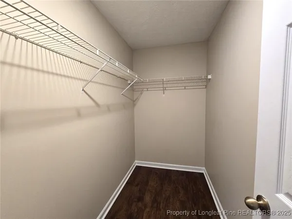 a kitchen with stainless steel appliances a stove a sink and a microwave