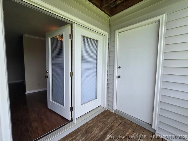 a view of a porch with a yard