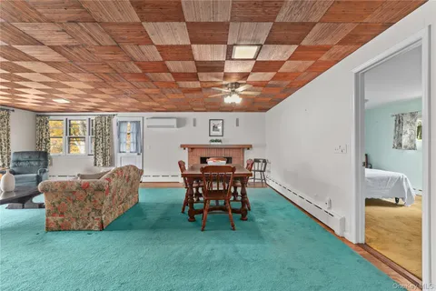 a view of an chairs and table in a patio