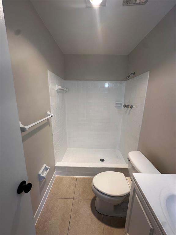 941 Crystal Lake Drive, Unit 201 Deerfield Beach, FL 33064 - Photo 16 of 27 a bathroom with a toilet and a shower