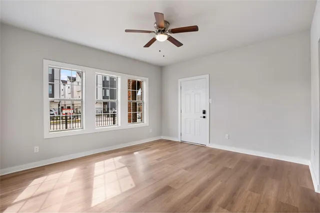 a view of an empty room with a window