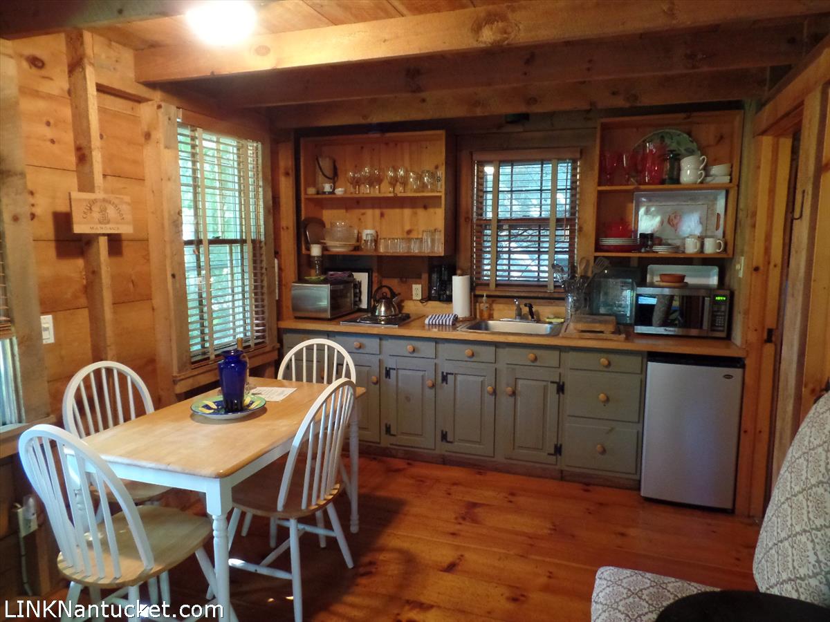 3 West Dover Street Nantucket, MA 02554 - Photo 3 of 4 a dining room with furniture and window