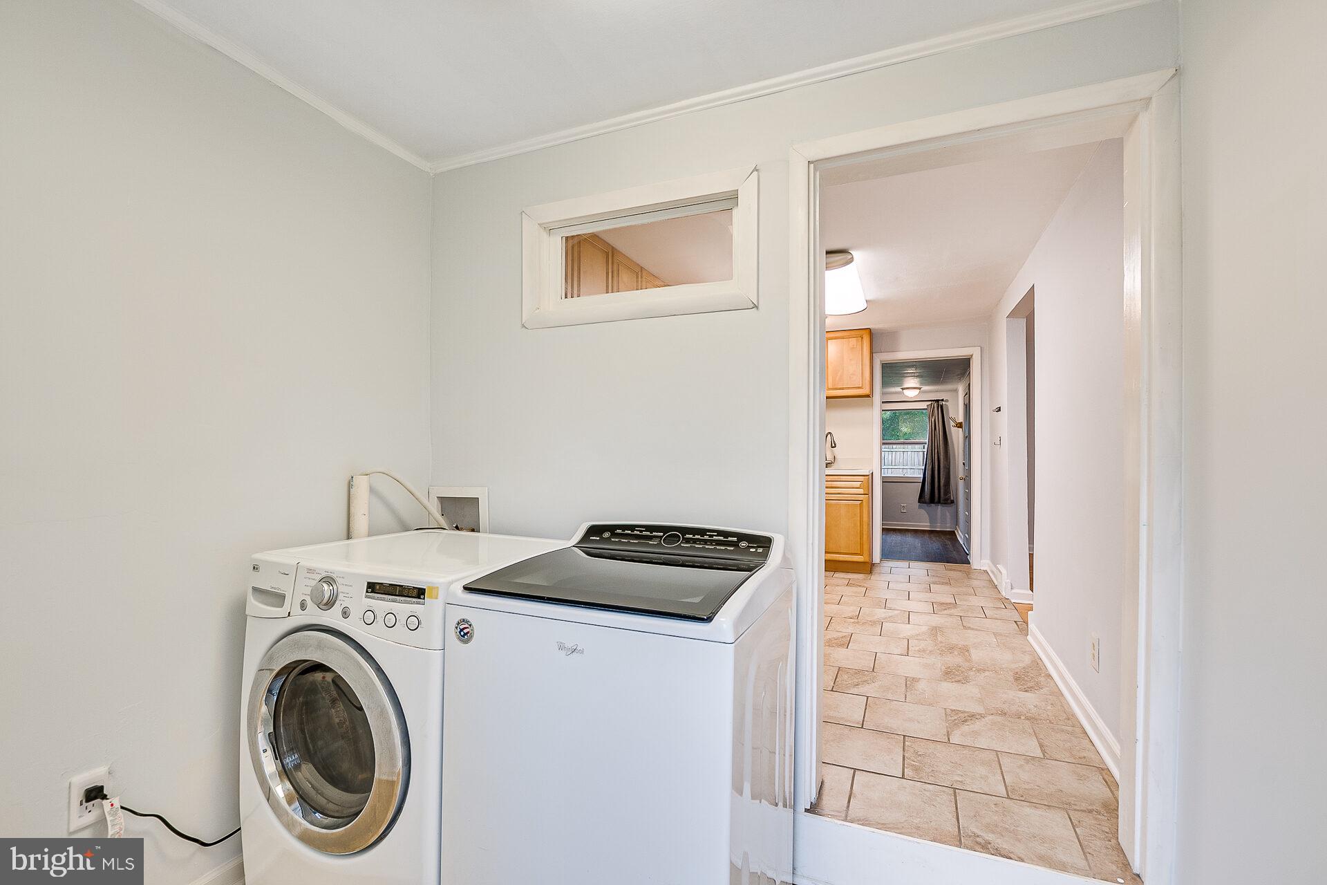 47 Wallace Road Princeton Junction, NJ 08550 - Photo 11 of 27 a view of a storage & utility room with washer and dryer
