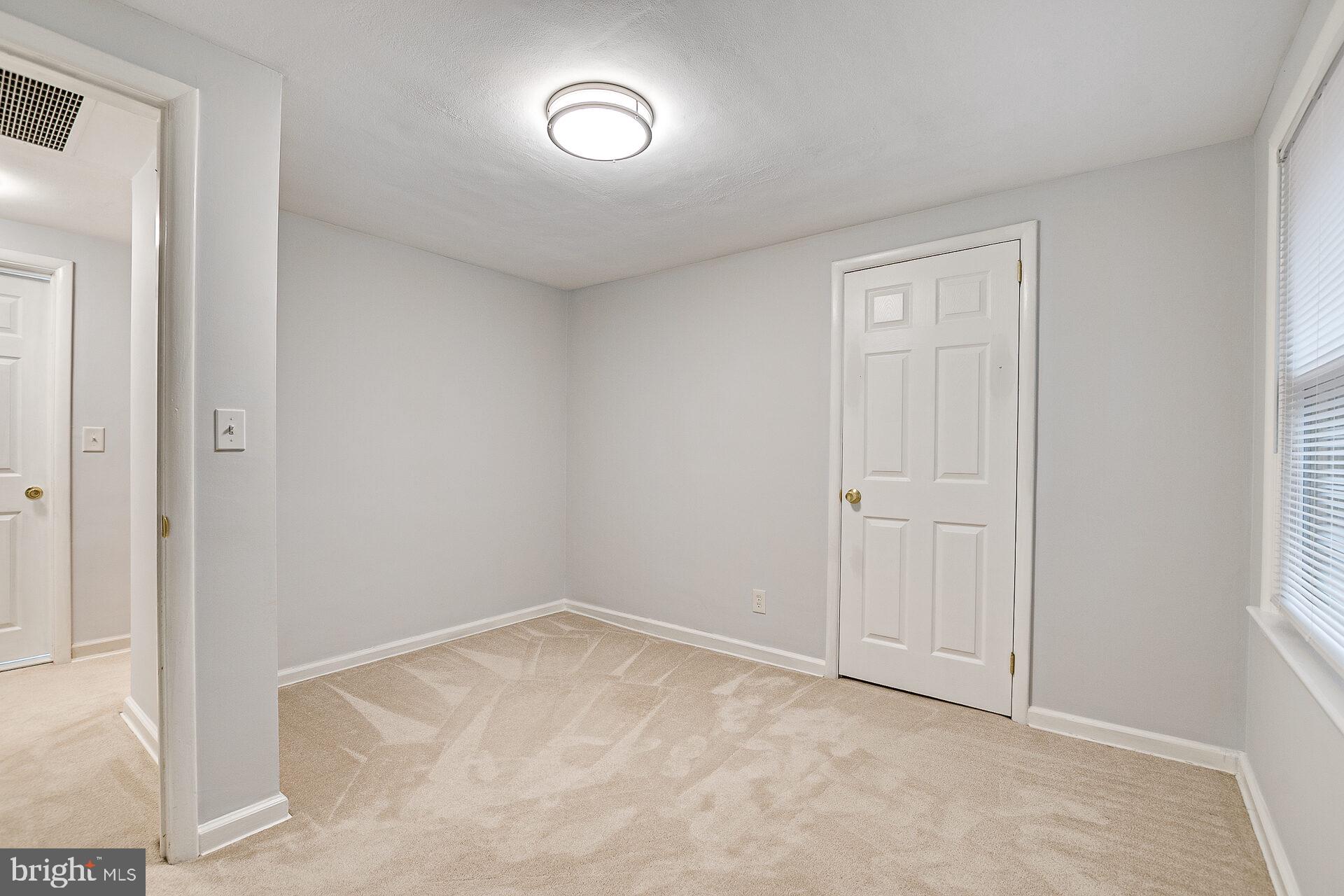 47 Wallace Road Princeton Junction, NJ 08550 - Photo 21 of 27 an empty room with a hallway