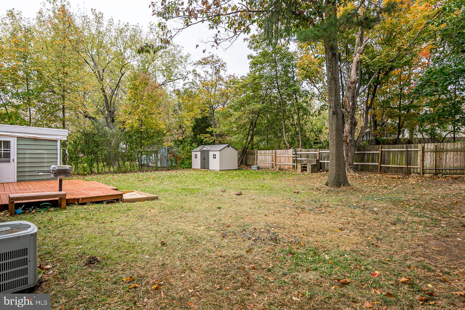 47 Wallace Road Princeton Junction, NJ 08550 - Photo 24 of 27 a backyard of a house with barbeque oven