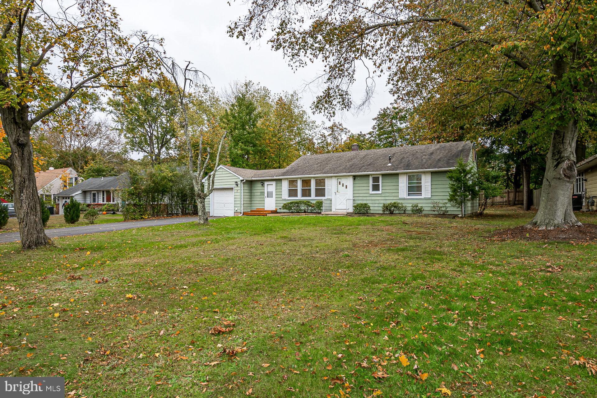 47 Wallace Road Princeton Junction, NJ 08550 - Photo 27 of 27 a house view with a garden space
