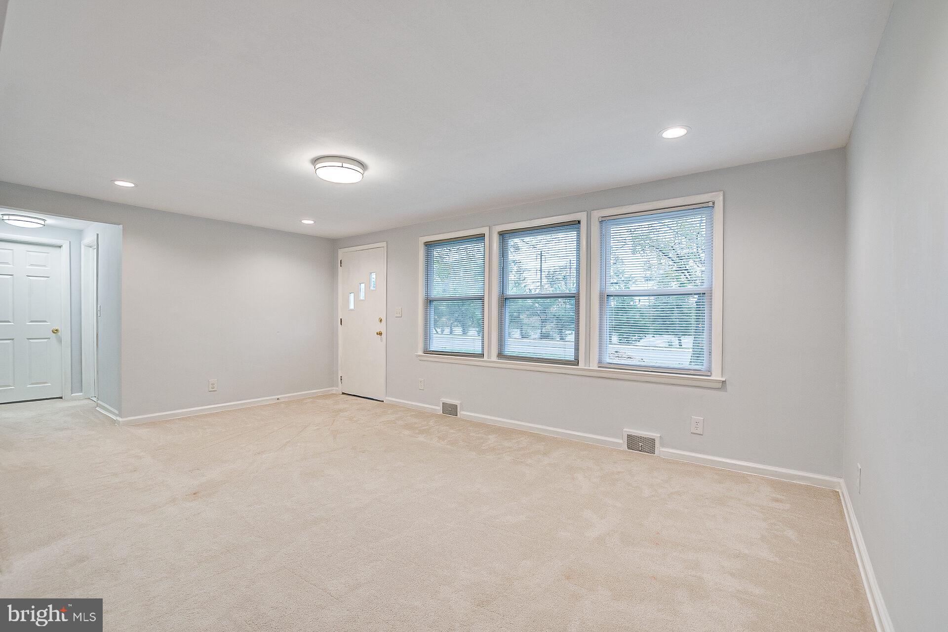 47 Wallace Road Princeton Junction, NJ 08550 - Photo 4 of 27 an empty room with windows