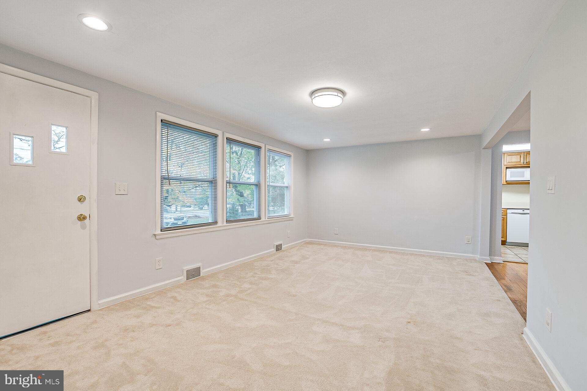 47 Wallace Road Princeton Junction, NJ 08550 - Photo 5 of 27 an empty room with windows