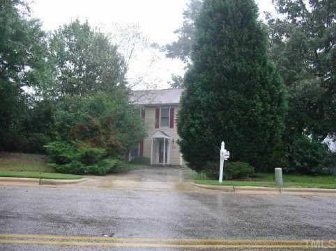 4620 Fox Road Raleigh, NC 27616 - Photo 1 of 1 a view of a house with a yard and large trees