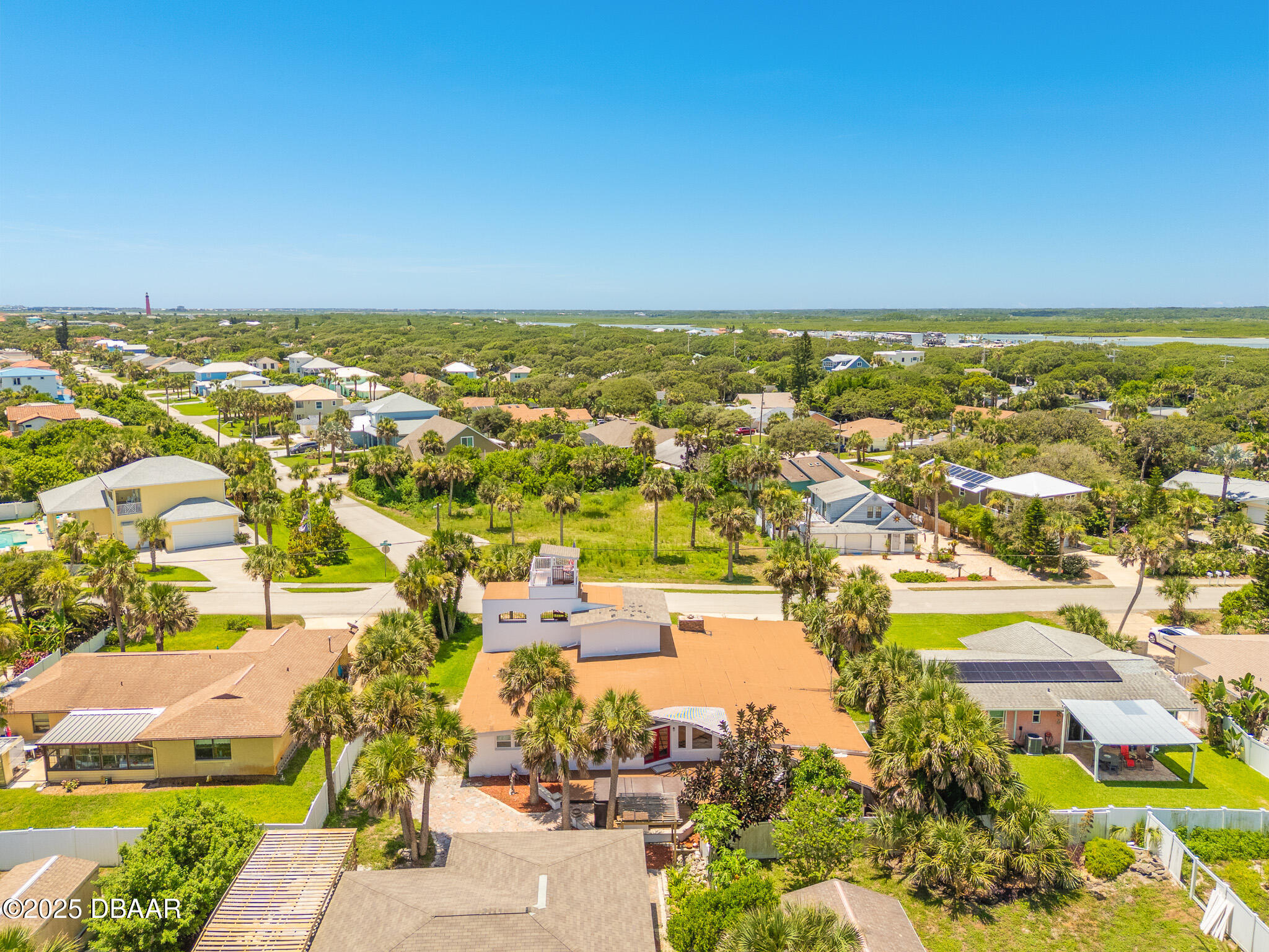 46 Oceanview Avenue Ponce Inlet, FL 32127 - Photo 74 of 79 a view of a city with an ocean