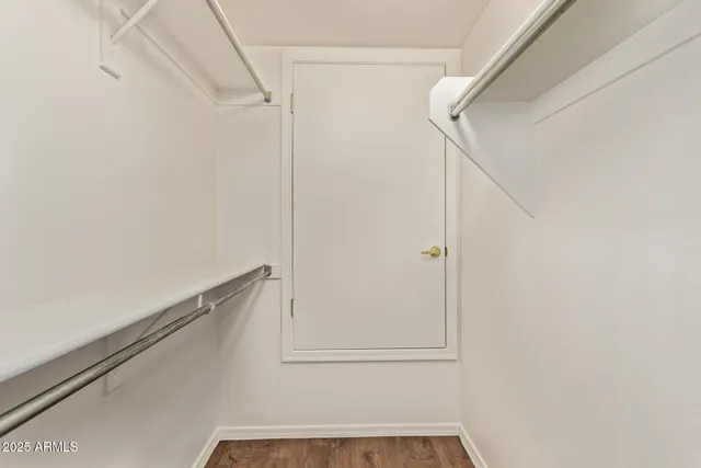 a view of small space with racks on the wall