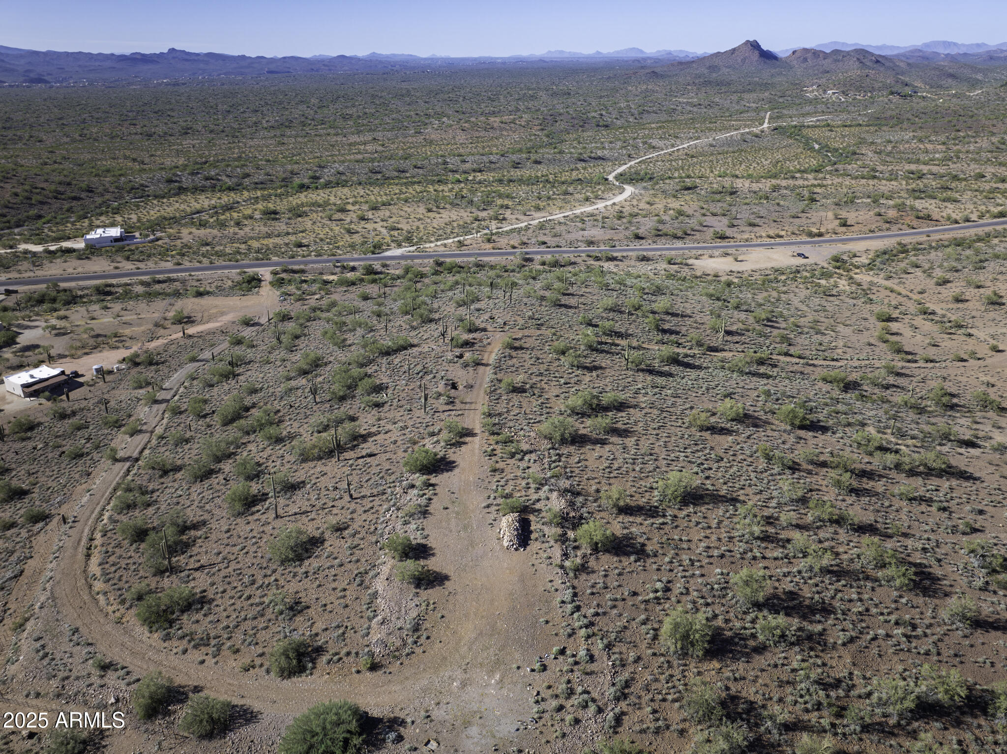 43327 North Castle Hot Springs Road, Unit TOP Morristown, AZ 85342 - Photo 11 of 15 a view of beach and a mountain