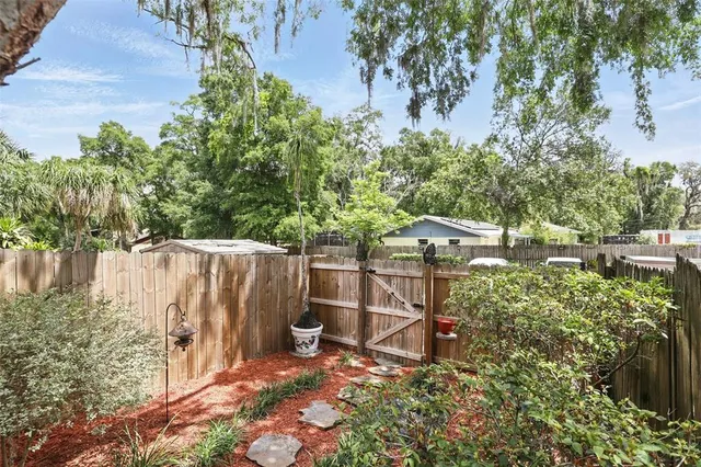 a garden view with a seating space