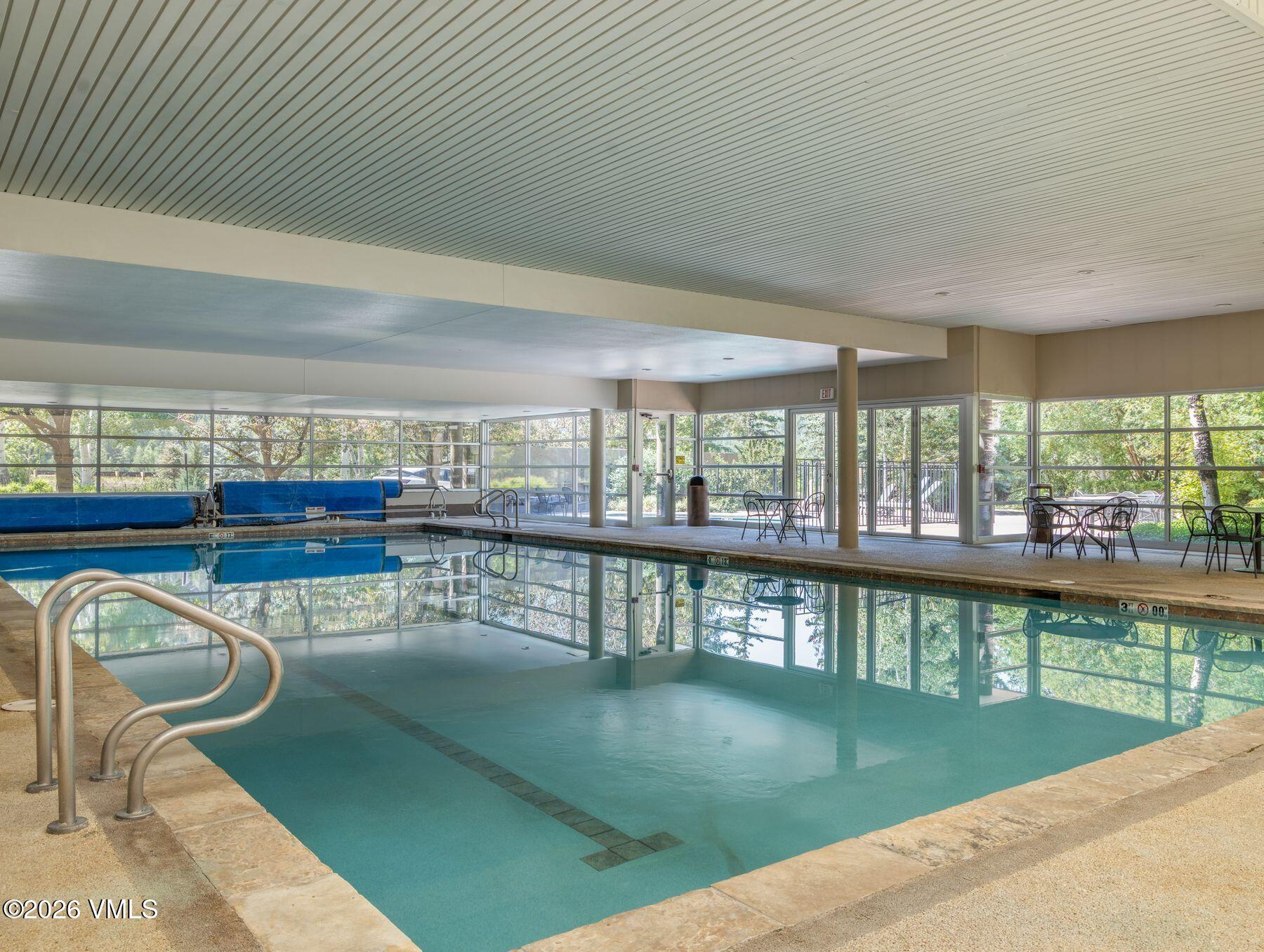 1100 North Frontage Road West, Unit 1503 Vail, CO 81657 - Photo 25 of 32 a view of a swimming pool and outdoor space