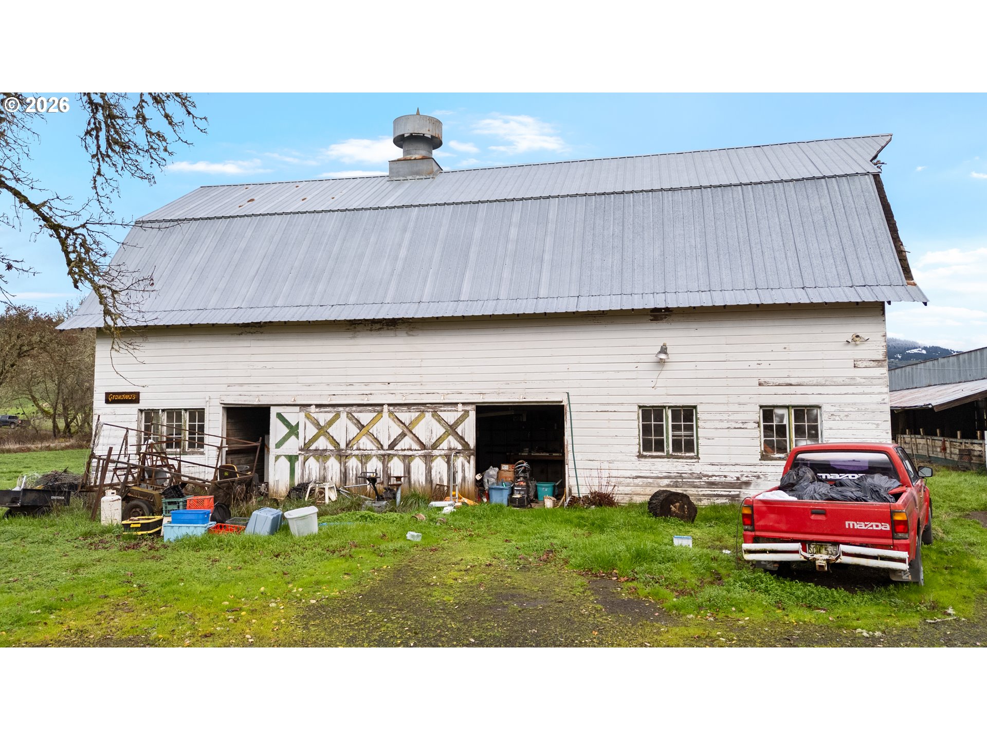 383 Brumbach Road Roseburg, OR 97470 - Photo 7 of 17 a black and white photo of a house with a backyard