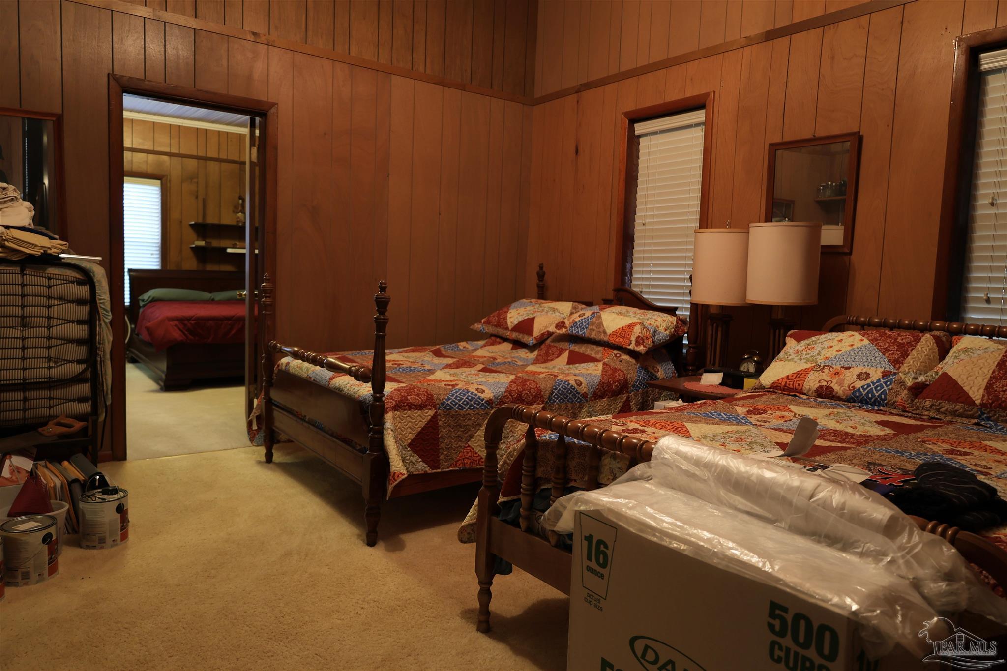 9023 County Road Millry, AL 36558 - Photo 13 of 72 a bed room with a bed and a lamp