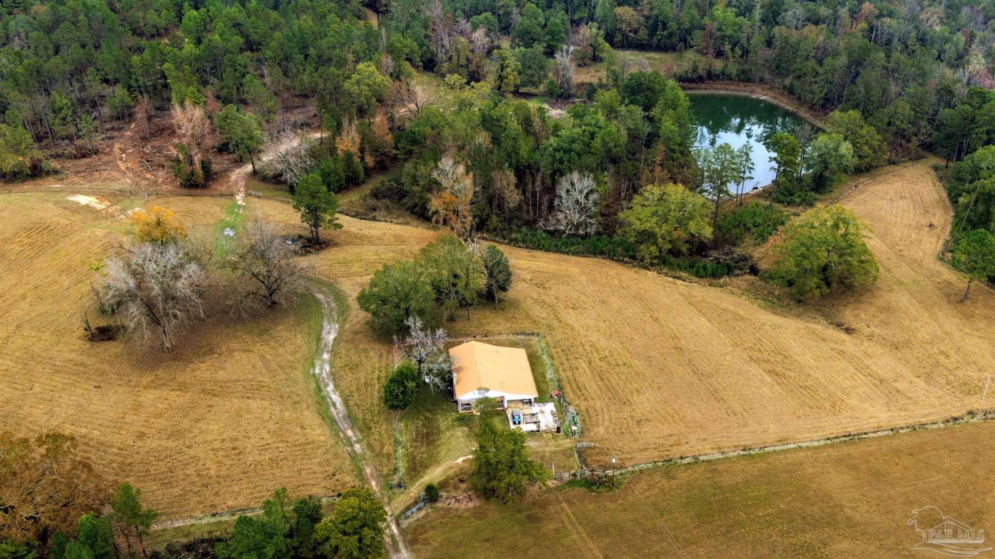 9023 County Road Millry, AL 36558 - Photo 2 of 72 an aerial view of a residential houses with outdoor space