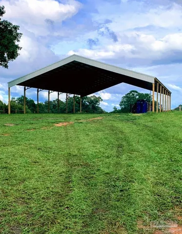 a view of a yard with an outdoor space