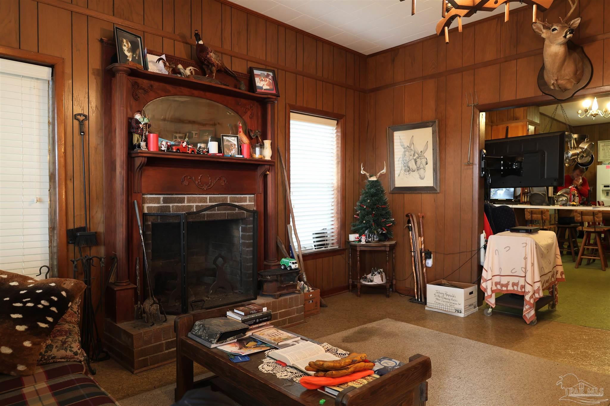9023 County Road Millry, AL 36558 - Photo 6 of 72 a living room with furniture and a fireplace