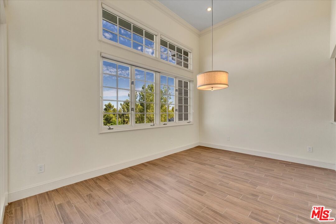 2202 The Terrace Los Angeles, CA 90049 - Photo 14 of 40 a view of an entryway with wooden floor