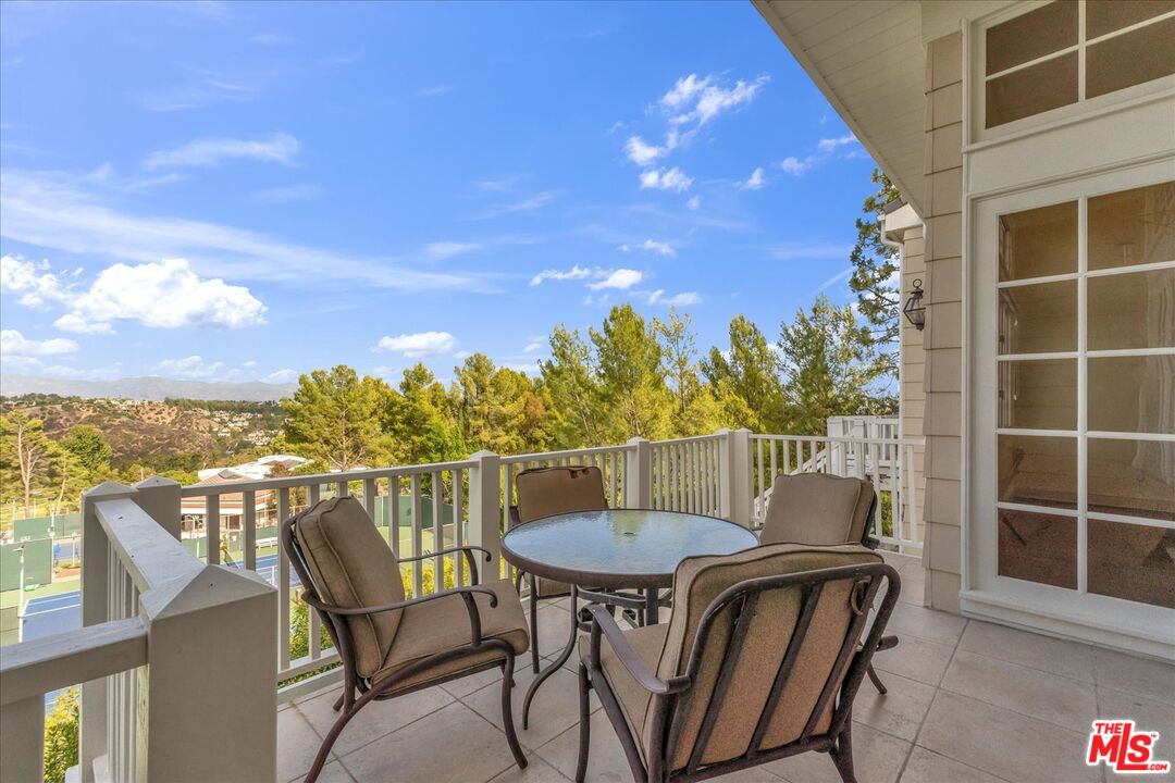 2202 The Terrace Los Angeles, CA 90049 - Photo 23 of 40 a view of a balcony with furniture