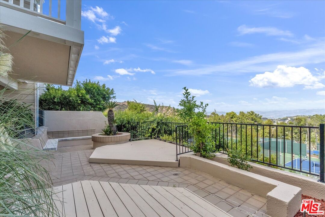 2202 The Terrace Los Angeles, CA 90049 - Photo 39 of 40 a view of a chairs and table on the terrace