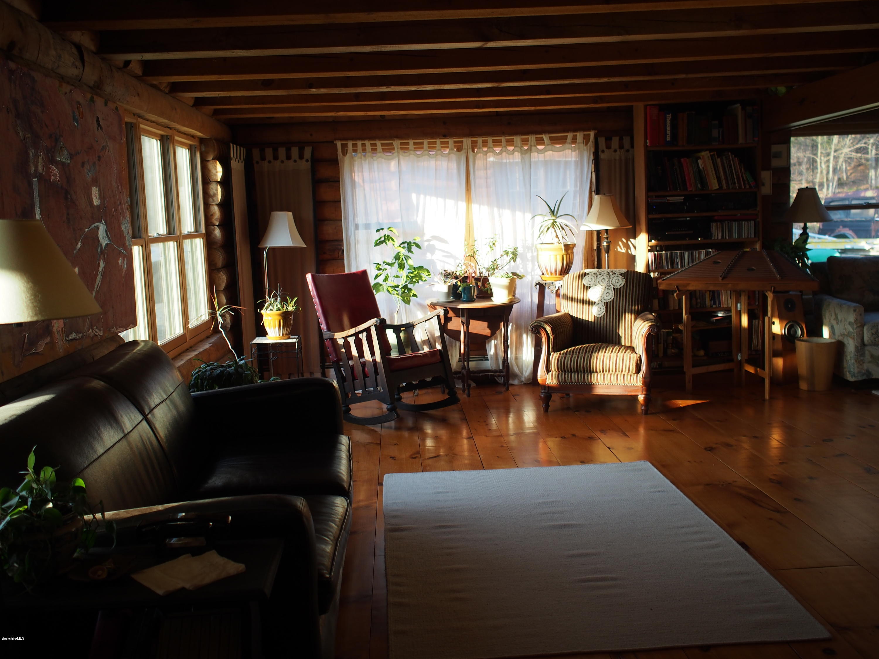 52 Central Shaft Road Florida, MA 01247 - Photo 17 of 31 a view of a dining room with furniture window and wooden floor