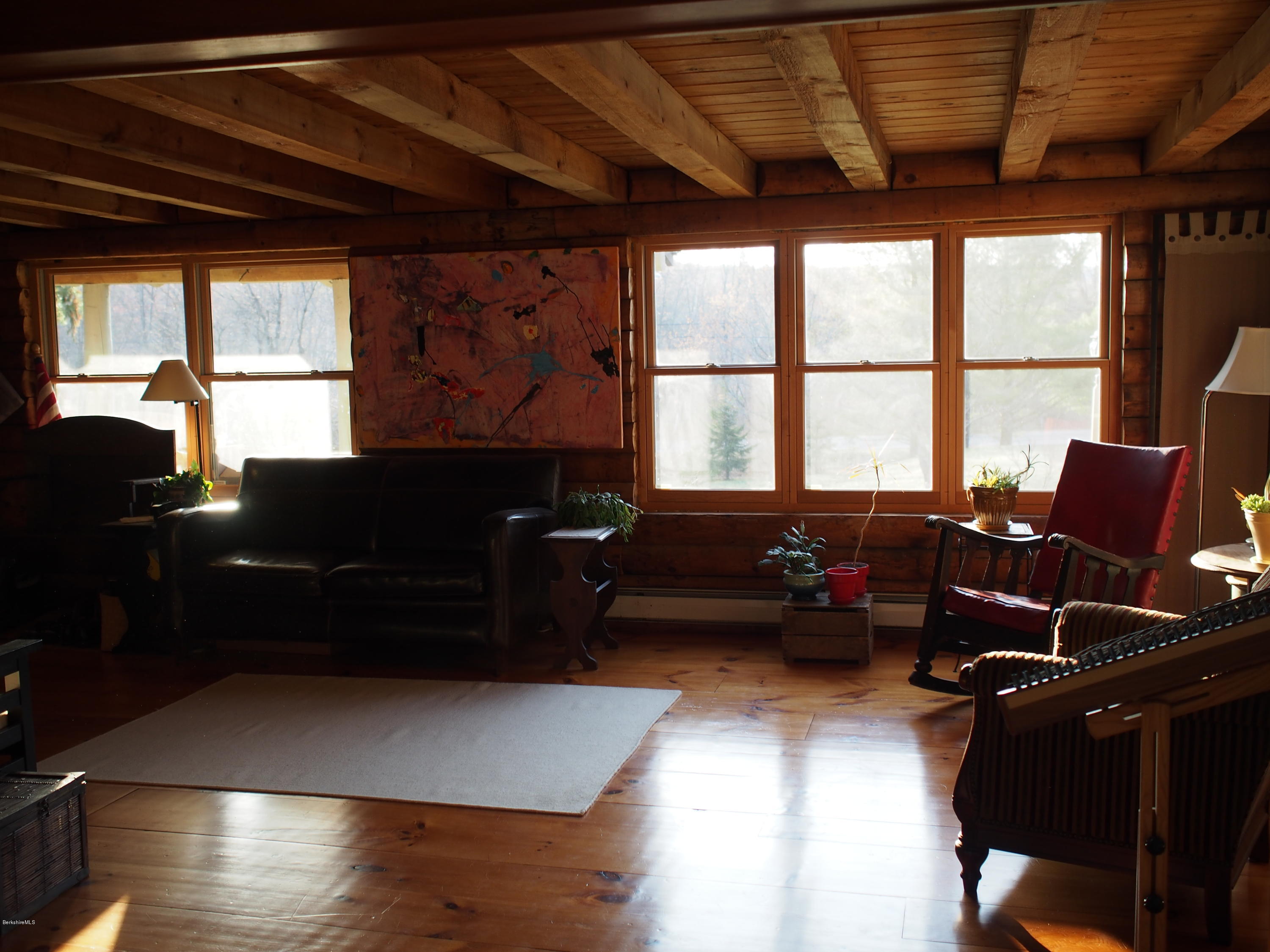 52 Central Shaft Road Florida, MA 01247 - Photo 18 of 31 a living room with furniture and a large window