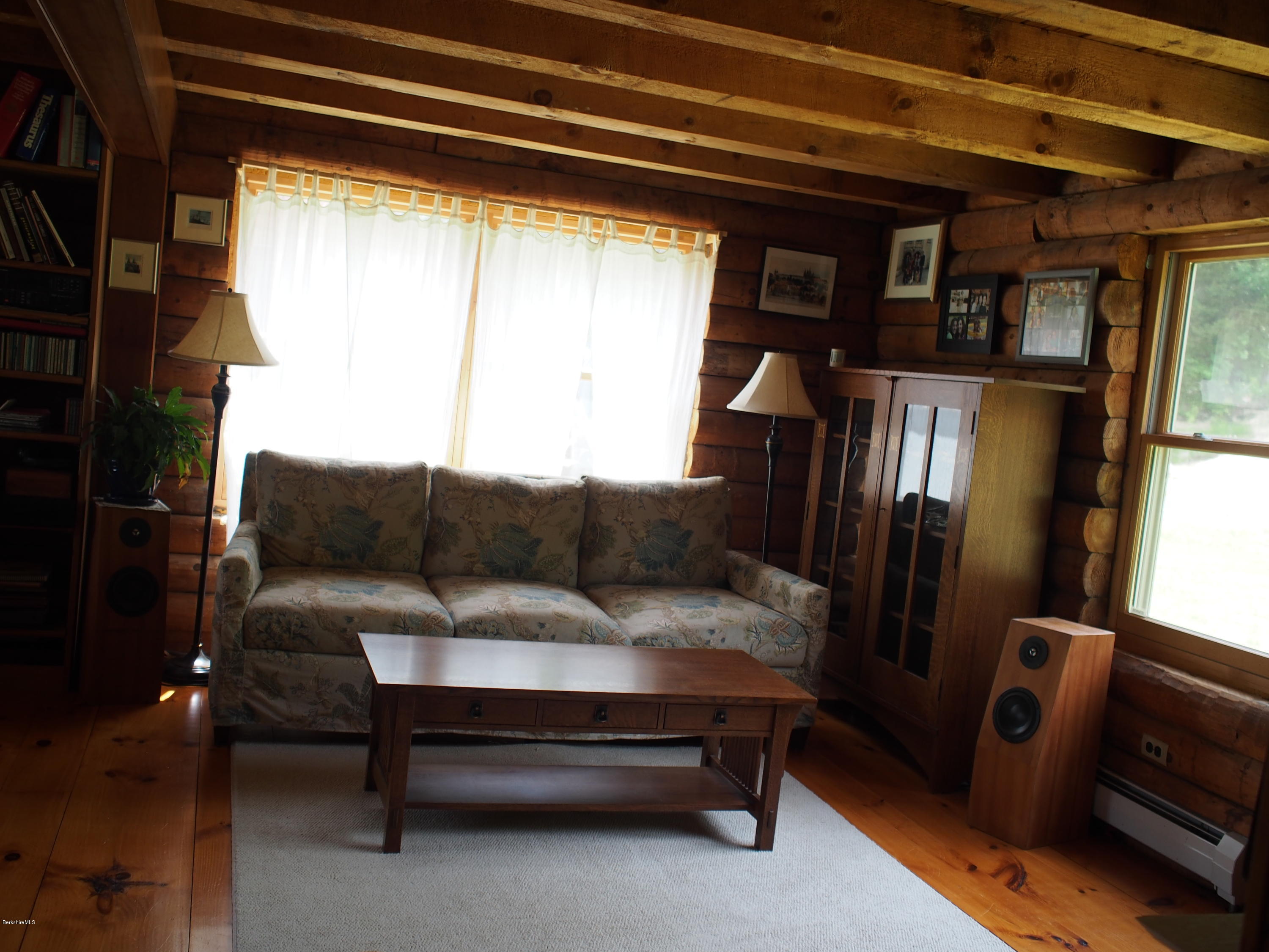 52 Central Shaft Road Florida, MA 01247 - Photo 19 of 31 a living room with furniture and a window