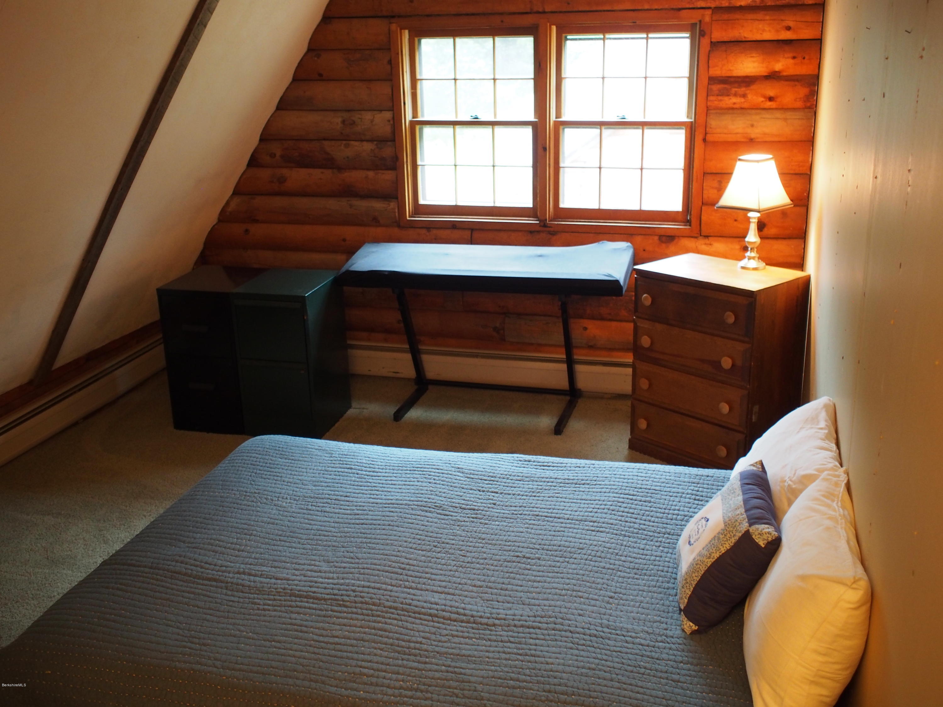 52 Central Shaft Road Florida, MA 01247 - Photo 21 of 31 a view of a room with wooden floor and windows