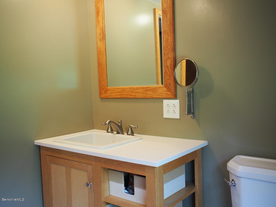 52 Central Shaft Road Florida, MA 01247 - Photo 28 of 31 a bathroom with a sink and a mirror