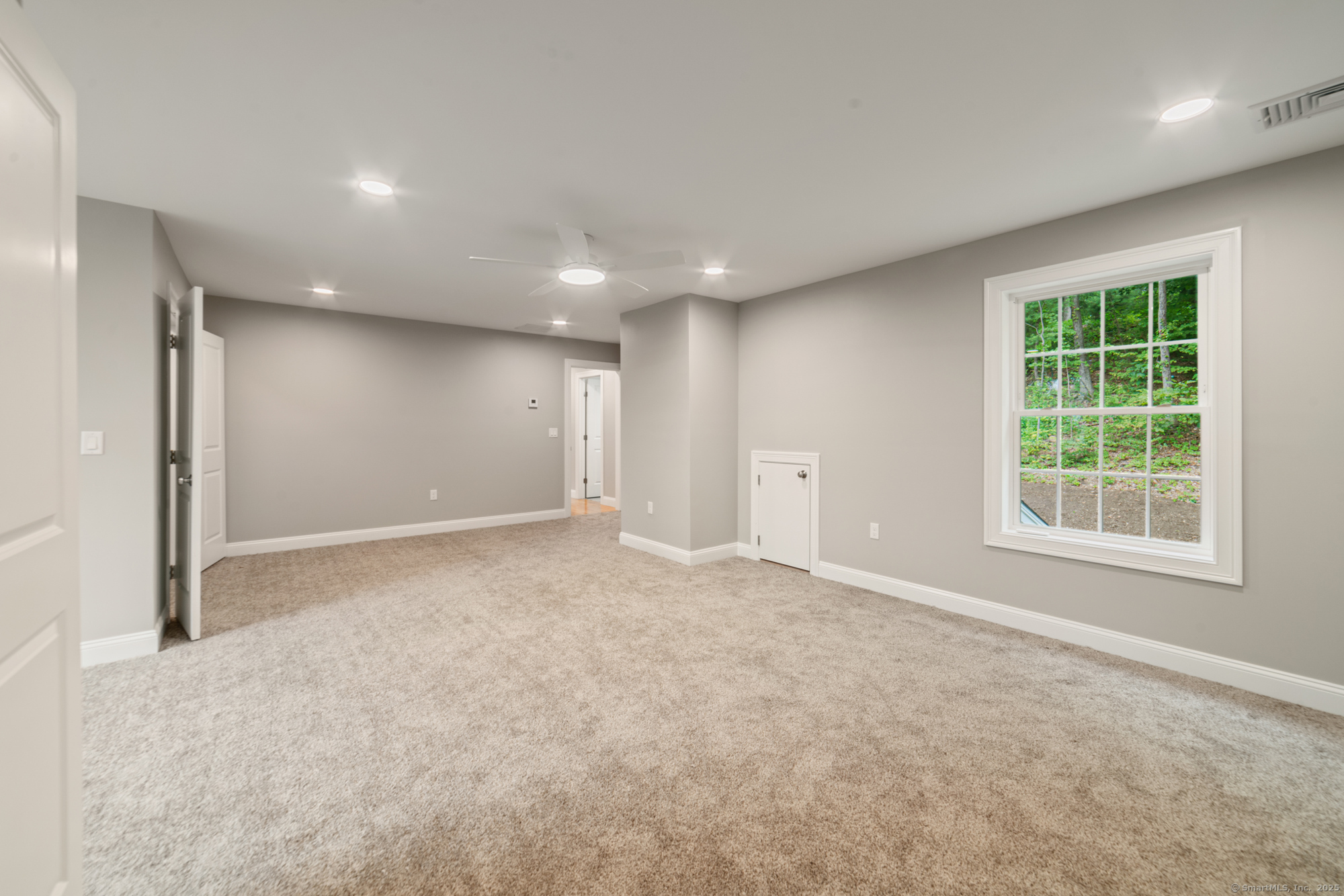 164 Fox Den Road Bristol, CT 06010 - Photo 19 of 40 an empty room with windows and closet