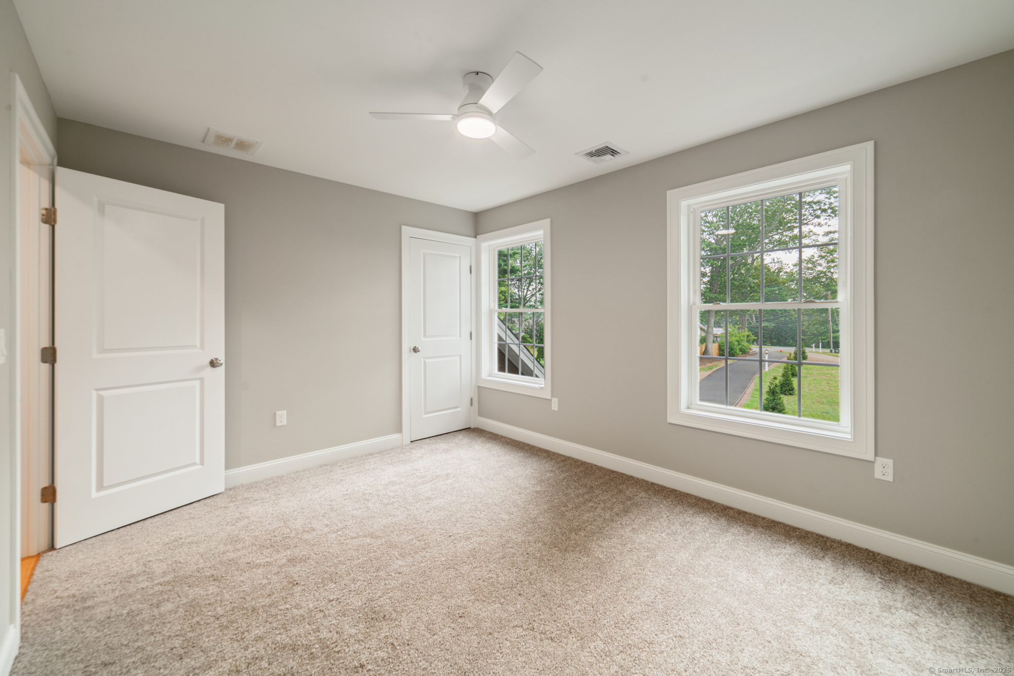 164 Fox Den Road Bristol, CT 06010 - Photo 24 of 40 an empty room with windows and closet