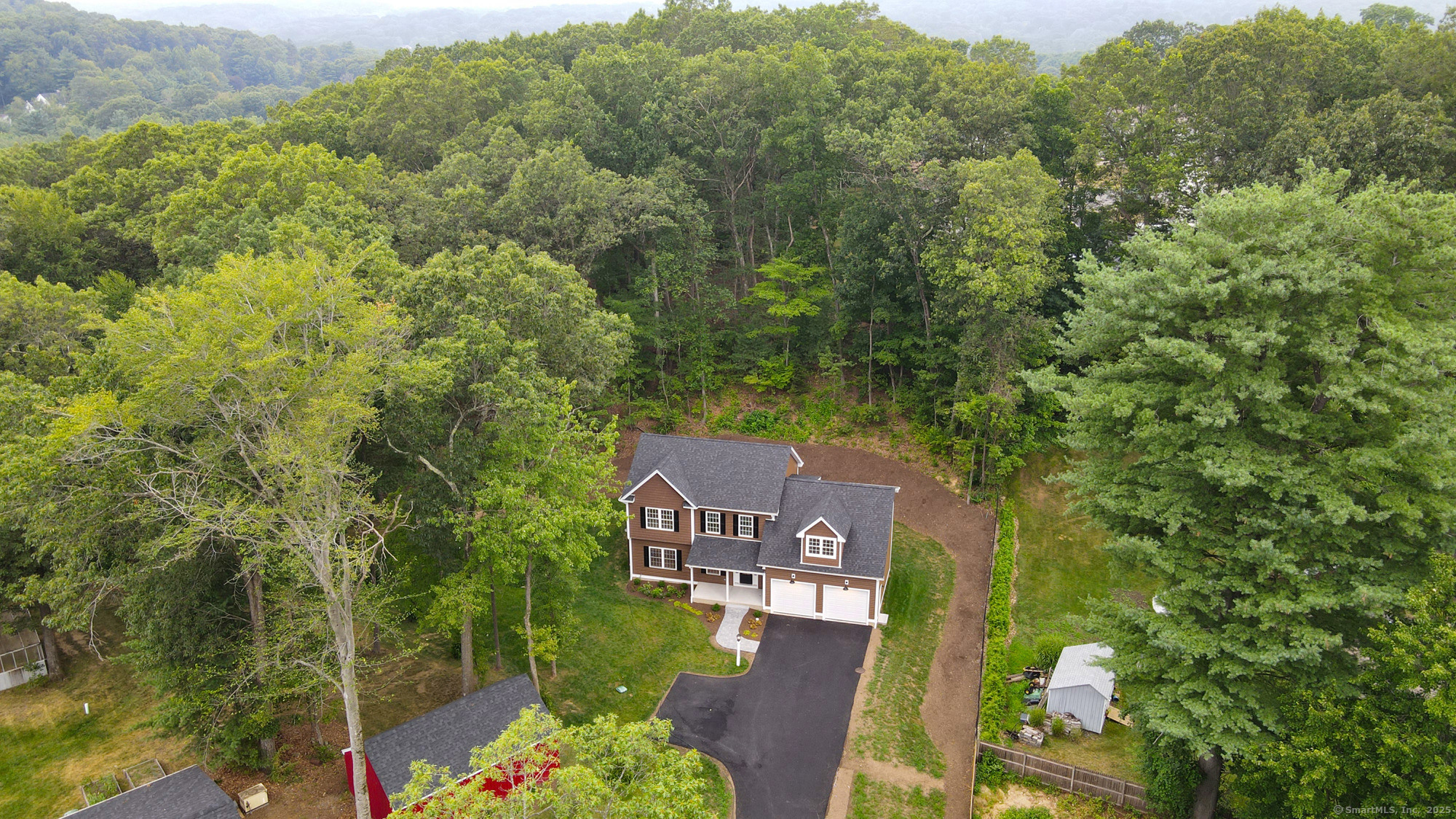 164 Fox Den Road Bristol, CT 06010 - Photo 35 of 40 an aerial view of a house with a yard