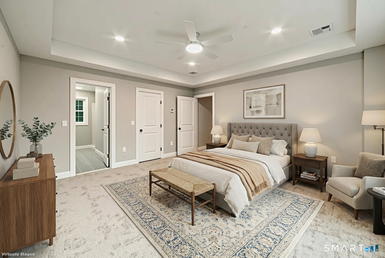 164 Fox Den Road Bristol, CT 06010 - Photo 6 of 40 a spacious bedroom with a large bed a chandelier and closet