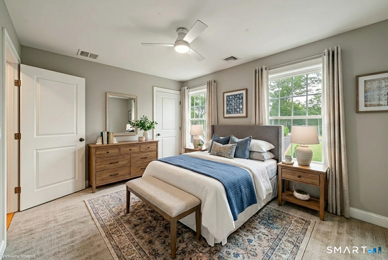 164 Fox Den Road Bristol, CT 06010 - Photo 7 of 40 a bed room with a bed and furniture