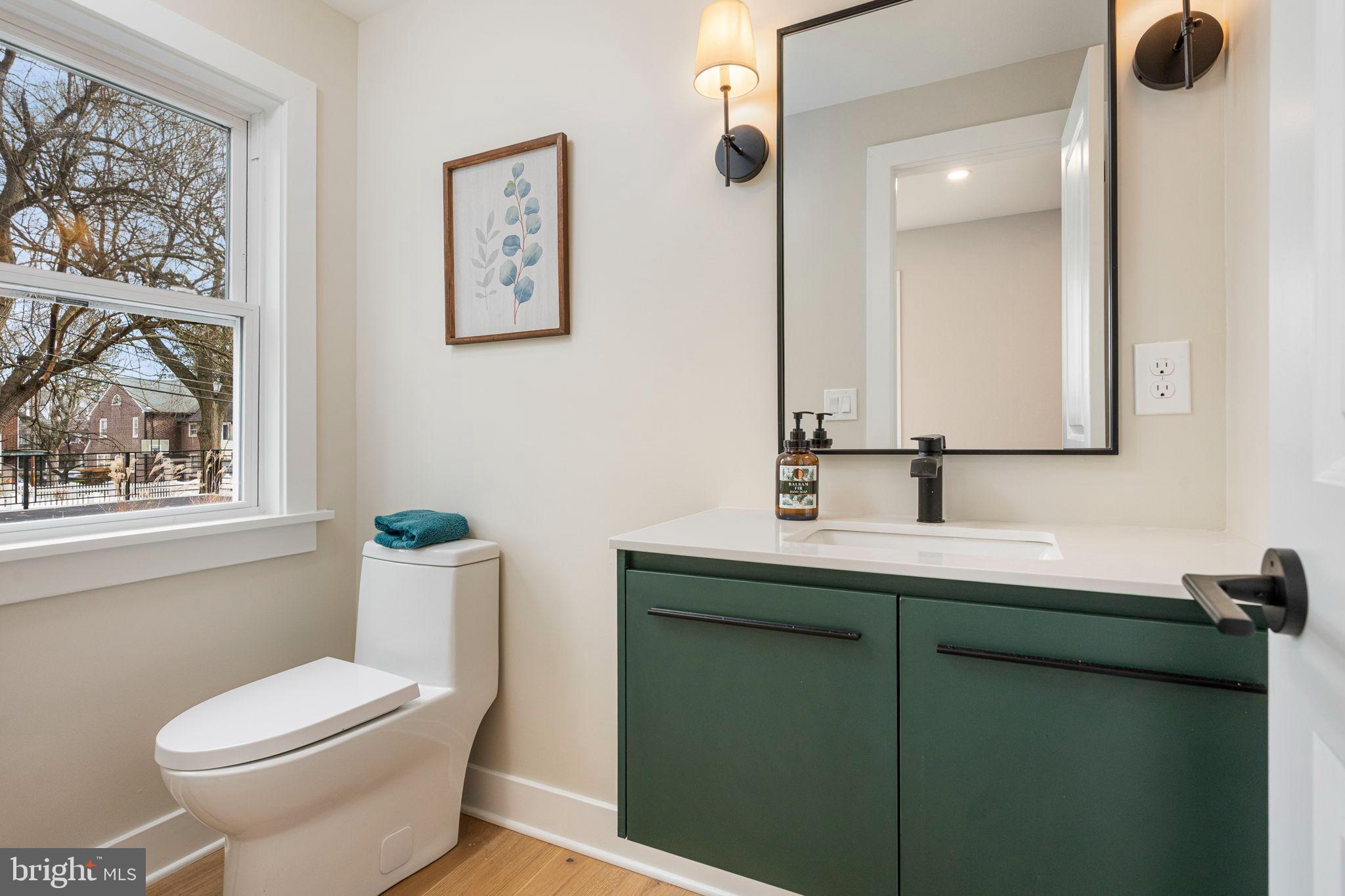 211 Bryn Mawr Avenue Bala Cynwyd, PA 19004 - Photo 27 of 59 Modern bathroom with stylish green accents.