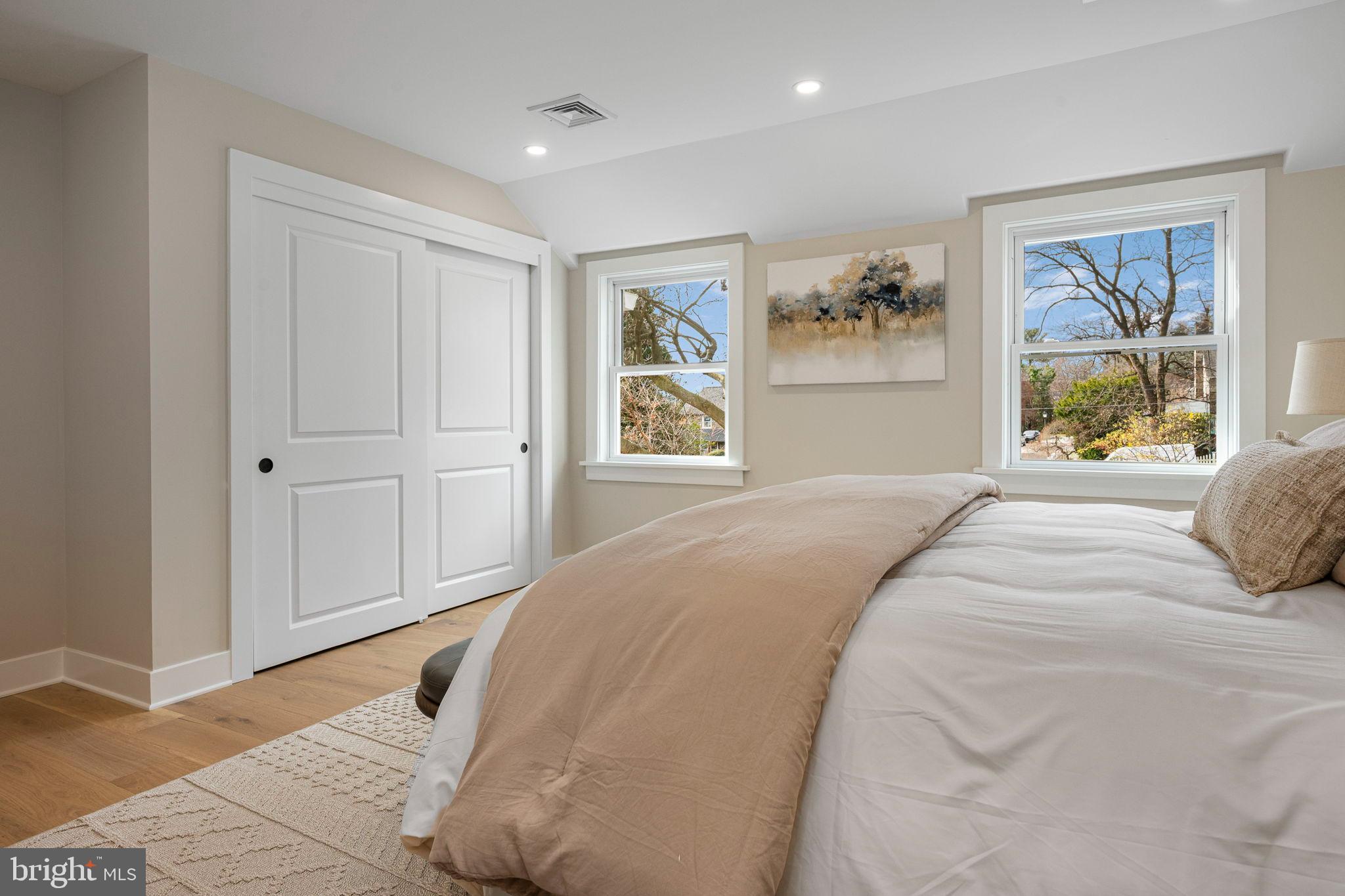 211 Bryn Mawr Avenue Bala Cynwyd, PA 19004 - Photo 30 of 59 Serene bedroom with natural light and views.