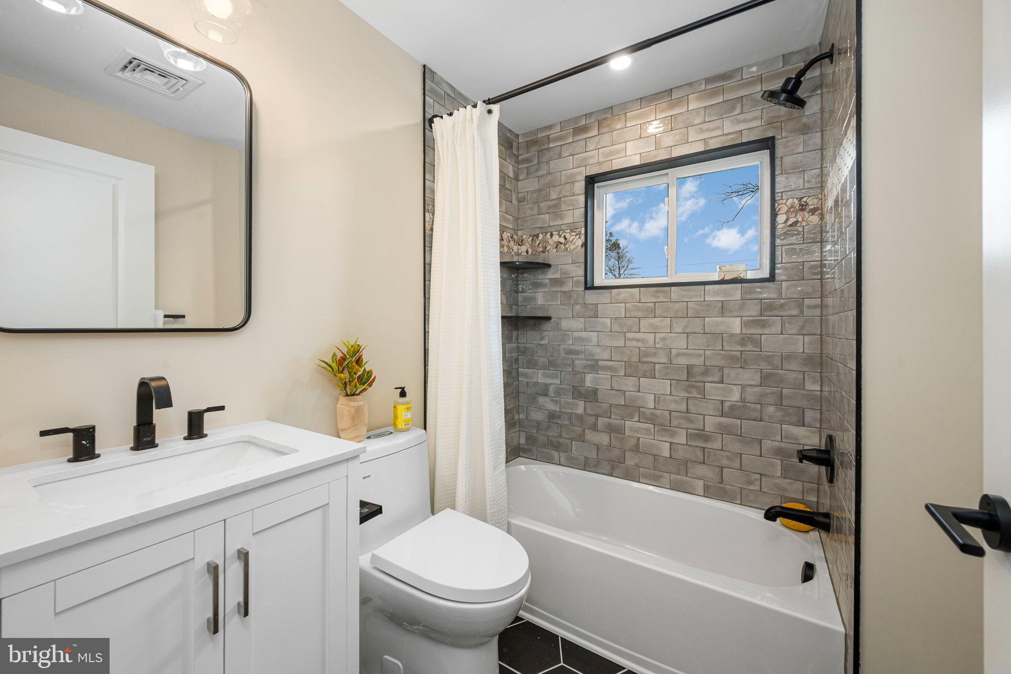211 Bryn Mawr Avenue Bala Cynwyd, PA 19004 - Photo 37 of 59 Modern bathroom with stylish finishes.