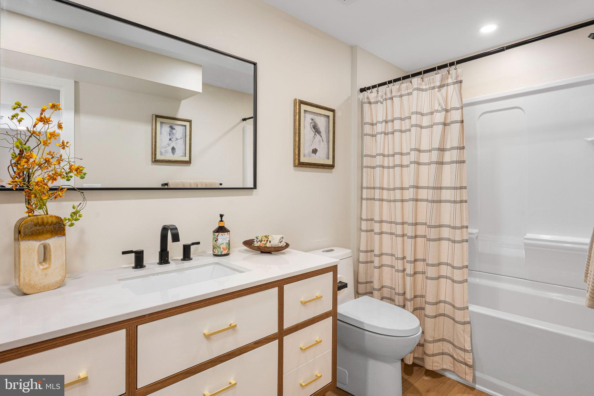 211 Bryn Mawr Avenue Bala Cynwyd, PA 19004 - Photo 39 of 59 Modern elegance in a serene bathroom retreat.