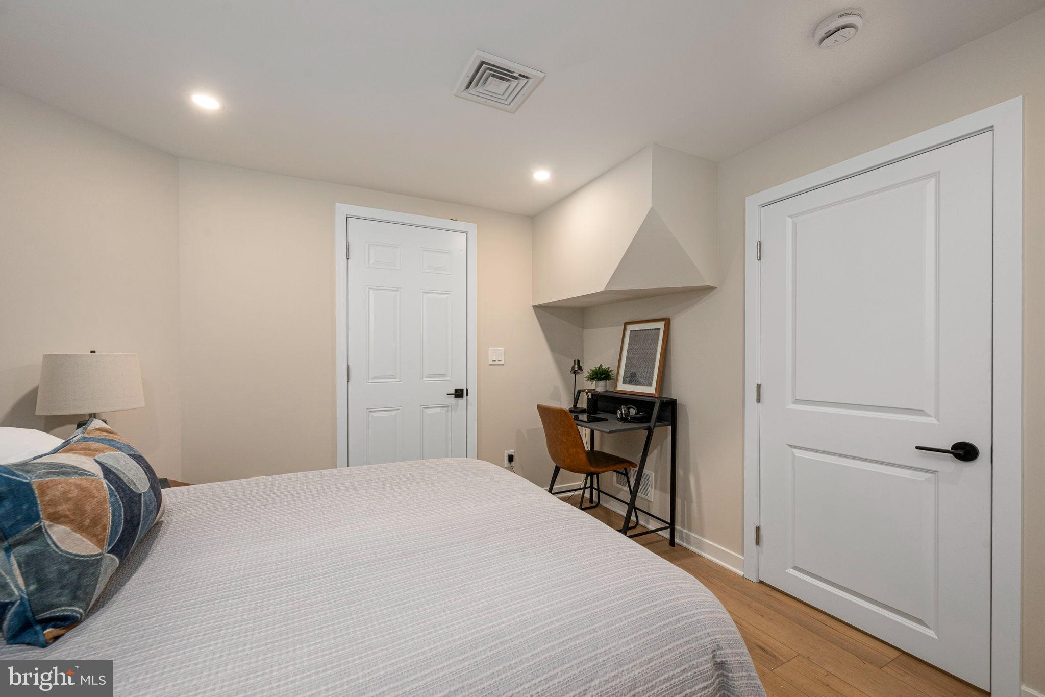 211 Bryn Mawr Avenue Bala Cynwyd, PA 19004 - Photo 44 of 59 Cozy bedroom with modern workspace.