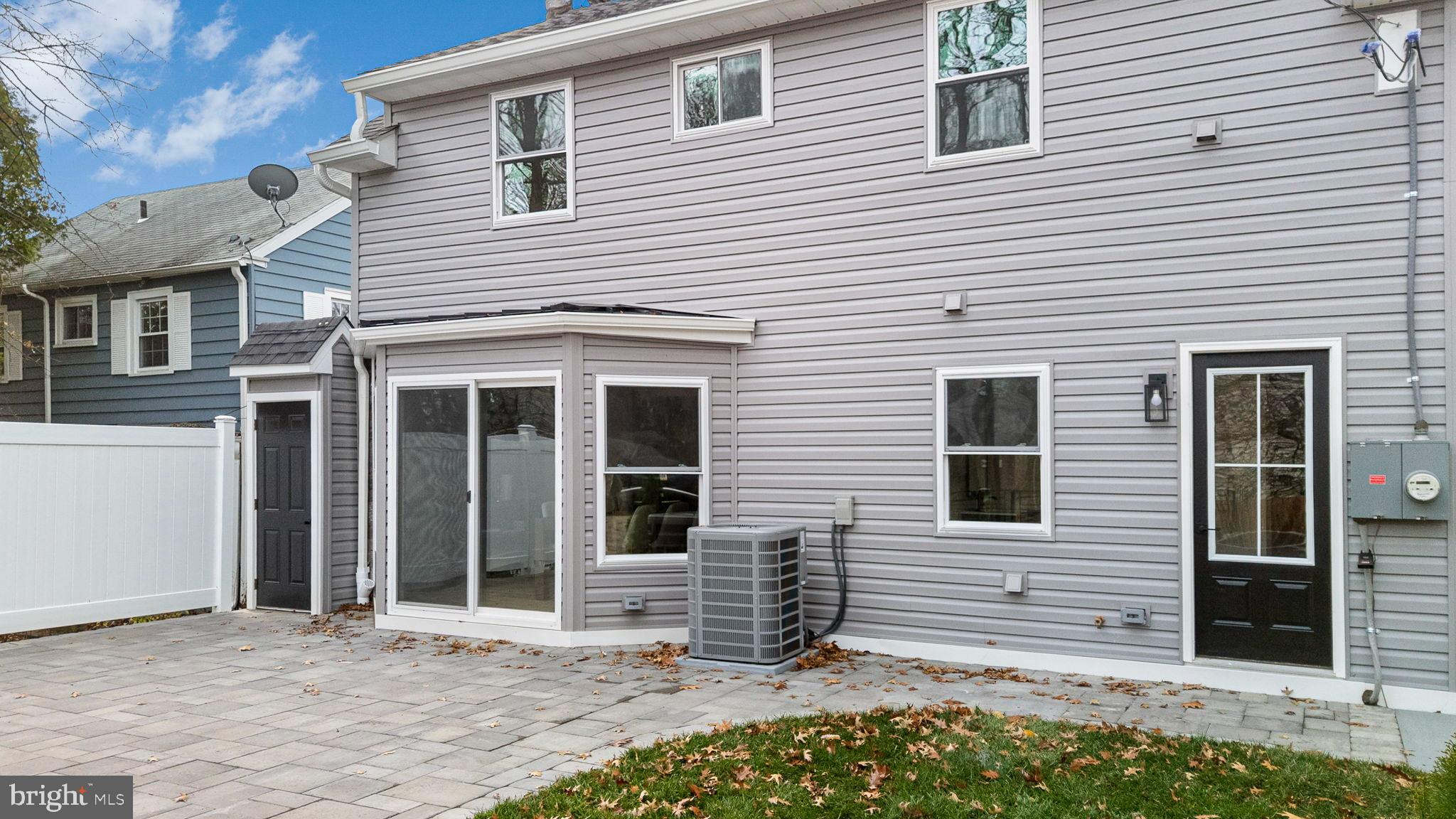 211 Bryn Mawr Avenue Bala Cynwyd, PA 19004 - Photo 53 of 59 Charming backyard with modern siding and patio.