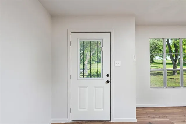 a view of an entryway with a window