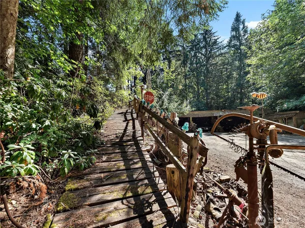 a view of a chairs and table in a patio