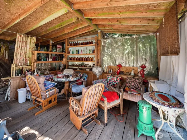a view of a wooden floor and a yard