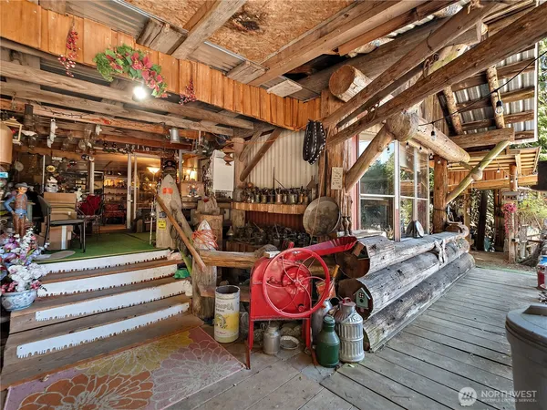 a view of entryway with wooden floor